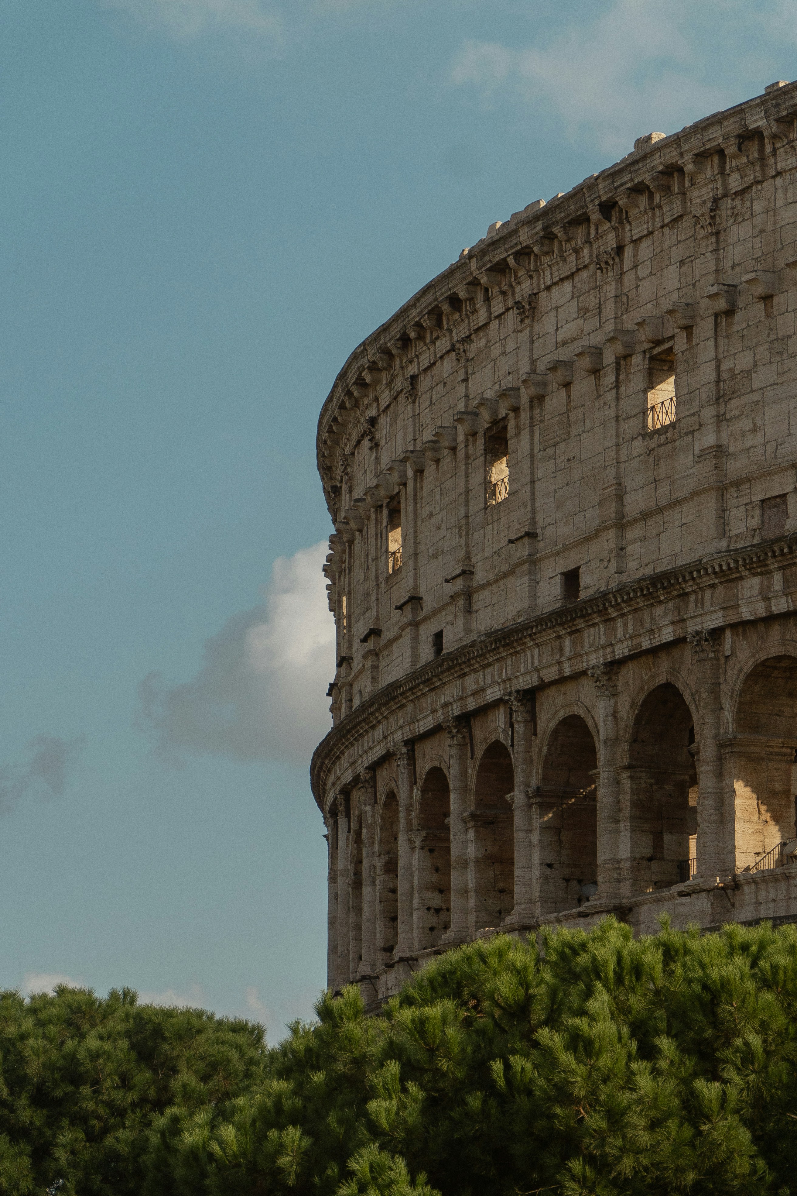 a very tall building with a clock on it's side