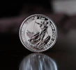 a close up of a coin on a table