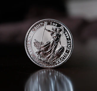 a close up of a coin on a table