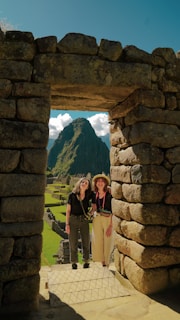 a couple of women standing next to each other