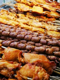 a bunch of food that is on a grill