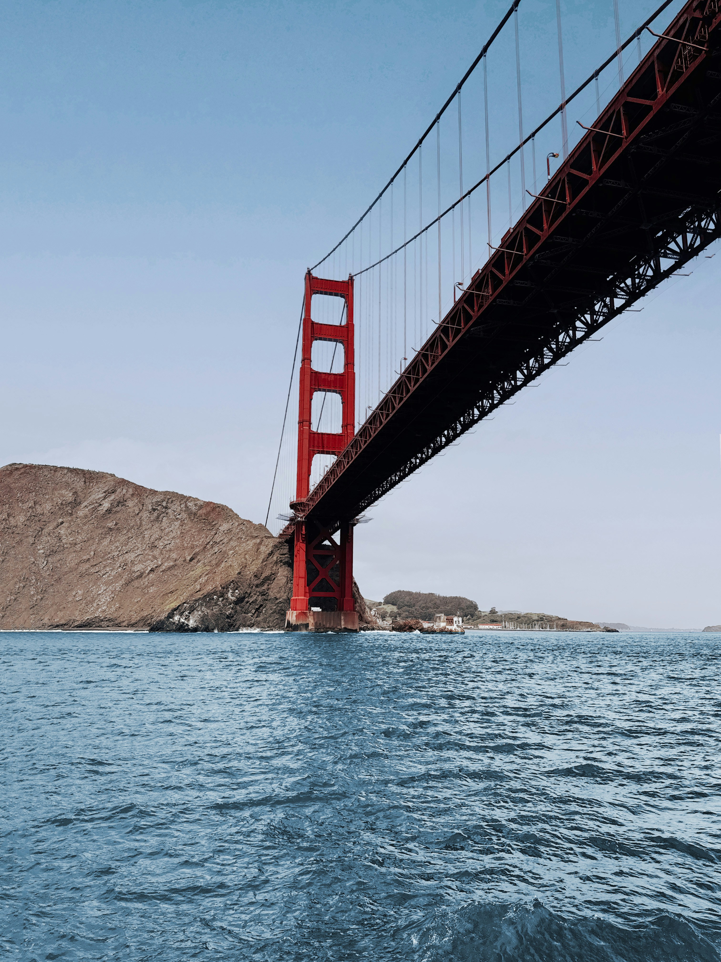 a view of the golden gate bridge from the water
