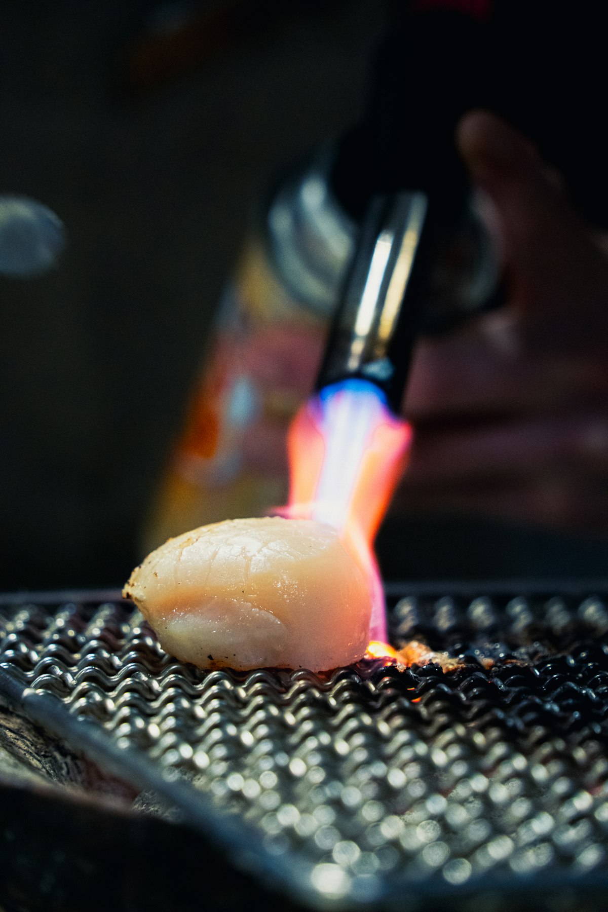 居酒屋桌上的お通し小碟——涼拌毛豆或醋物