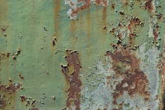 a close up of a rusted metal surface