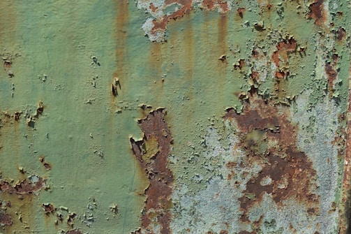 a close up of a rusted metal surface