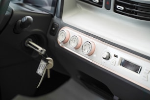 a close up of a car dashboard with a key
