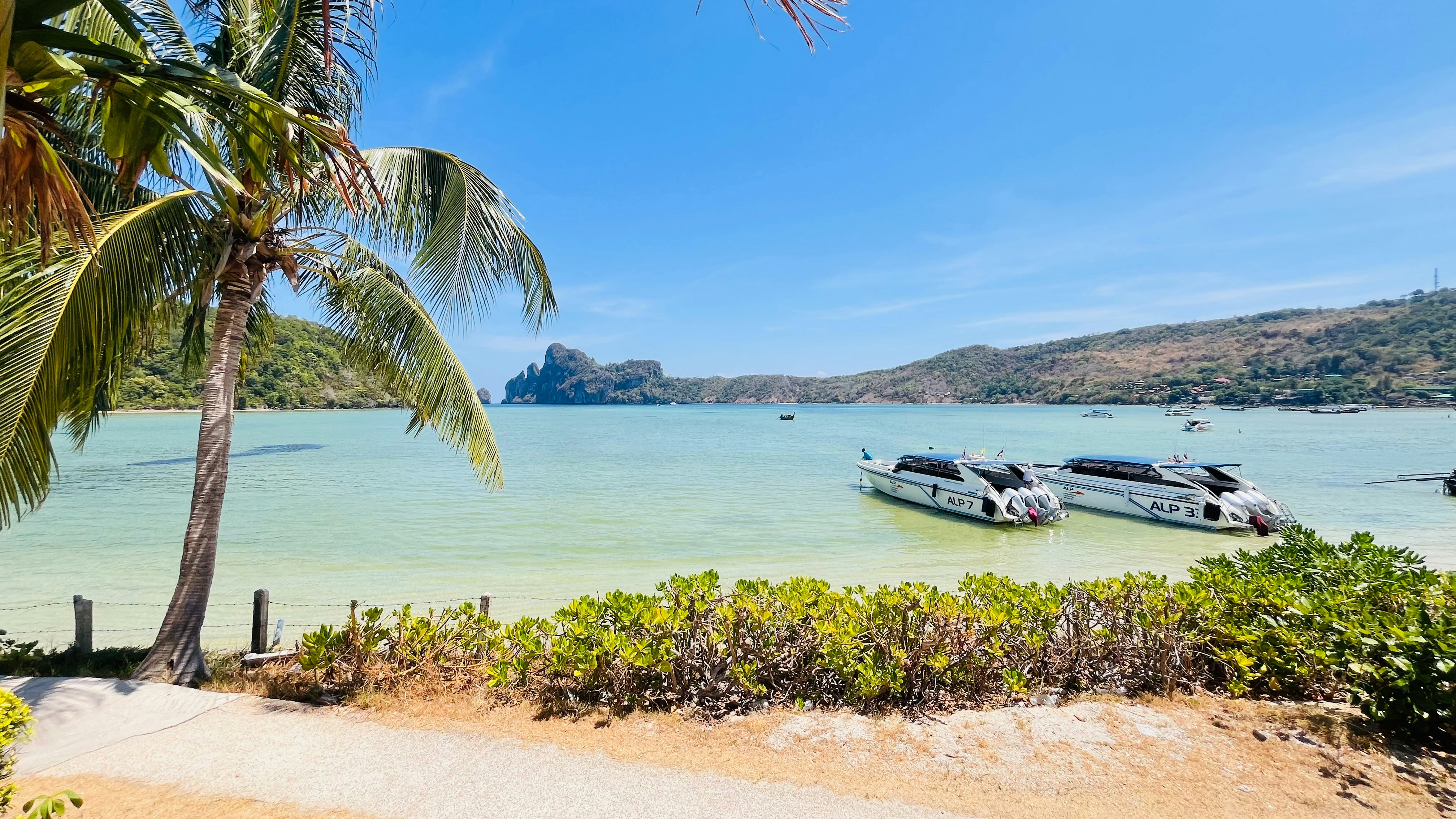a couple of boats that are sitting in the water
