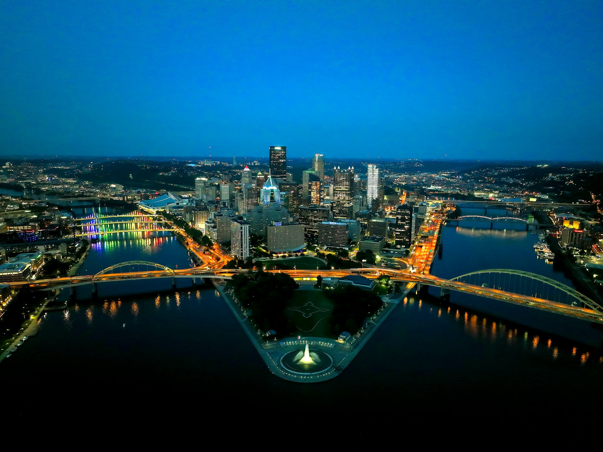 an aerial view of a city at night