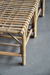 a close up of a bamboo bed frame