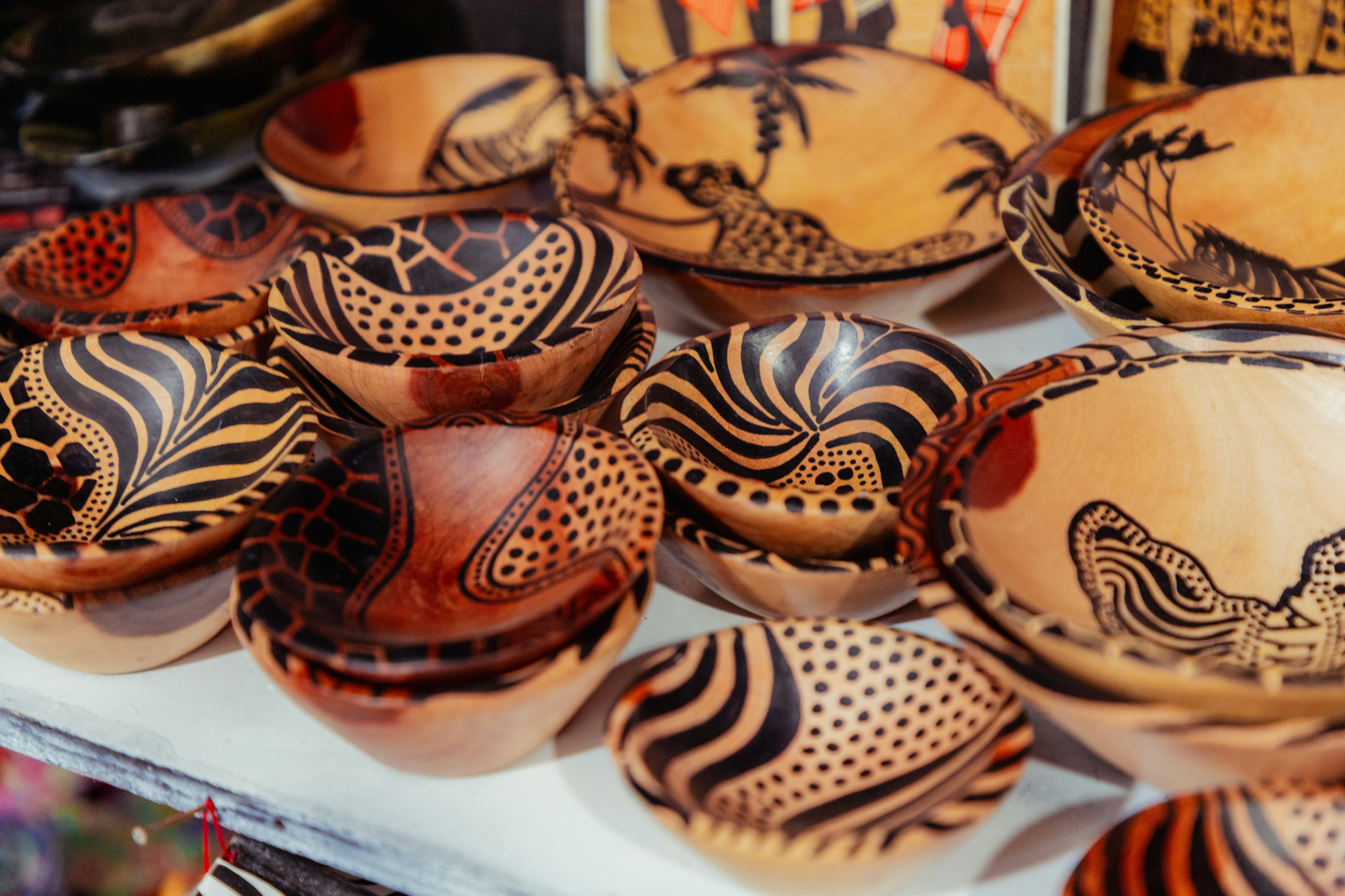 Decorated calabash bowls used in Kenyan traditions