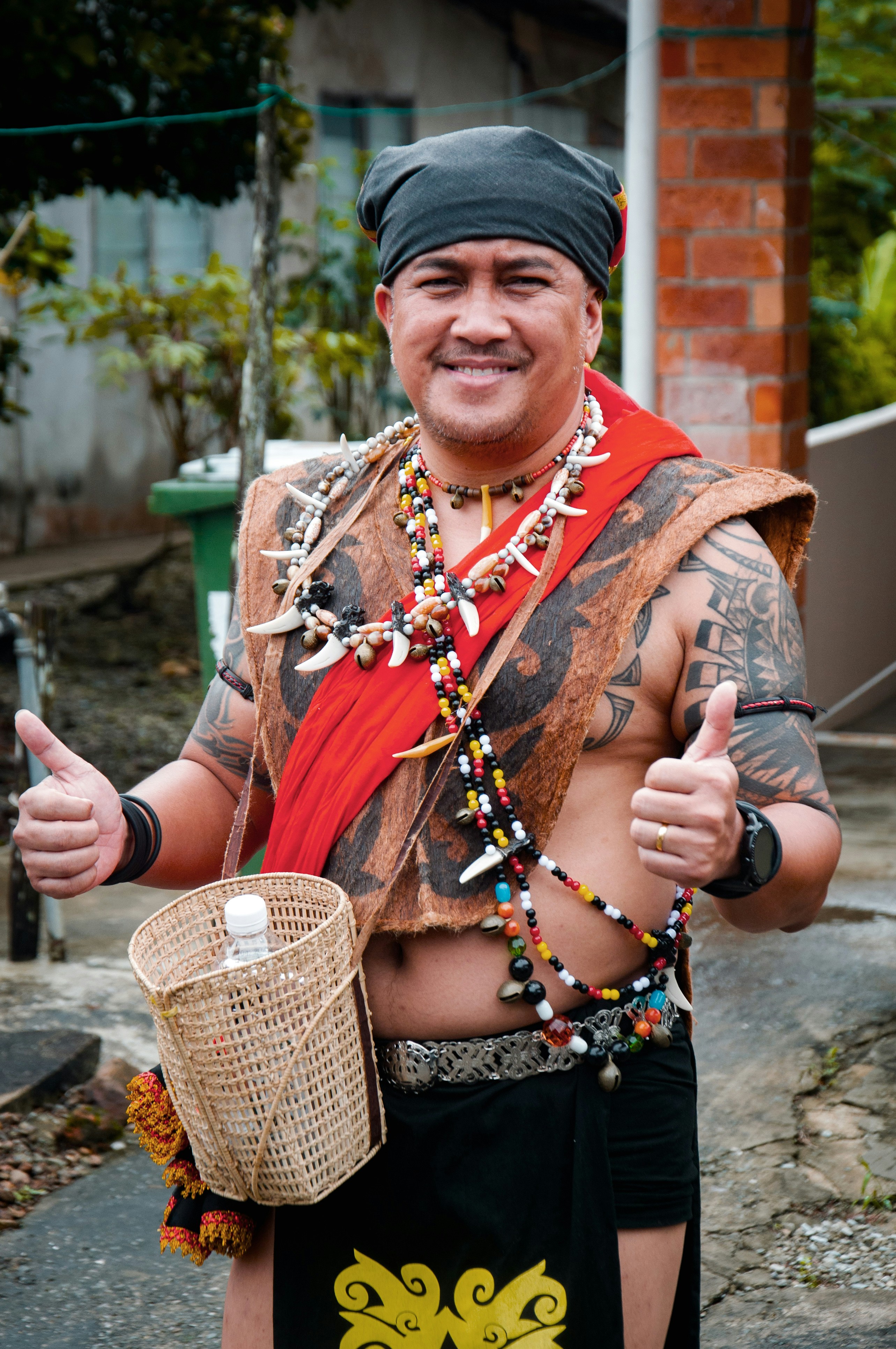 a man in a costume giving a thumbs up