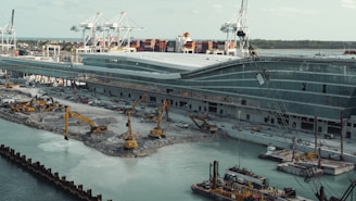 a large ship is docked at a dock