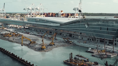 a large ship is docked at a dock