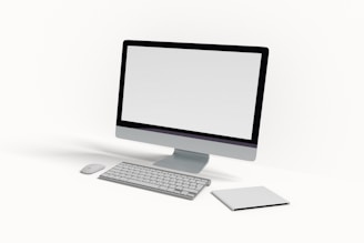 A computer monitor sitting on top of a desk