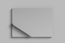 The corner of a square white paper on a gray background