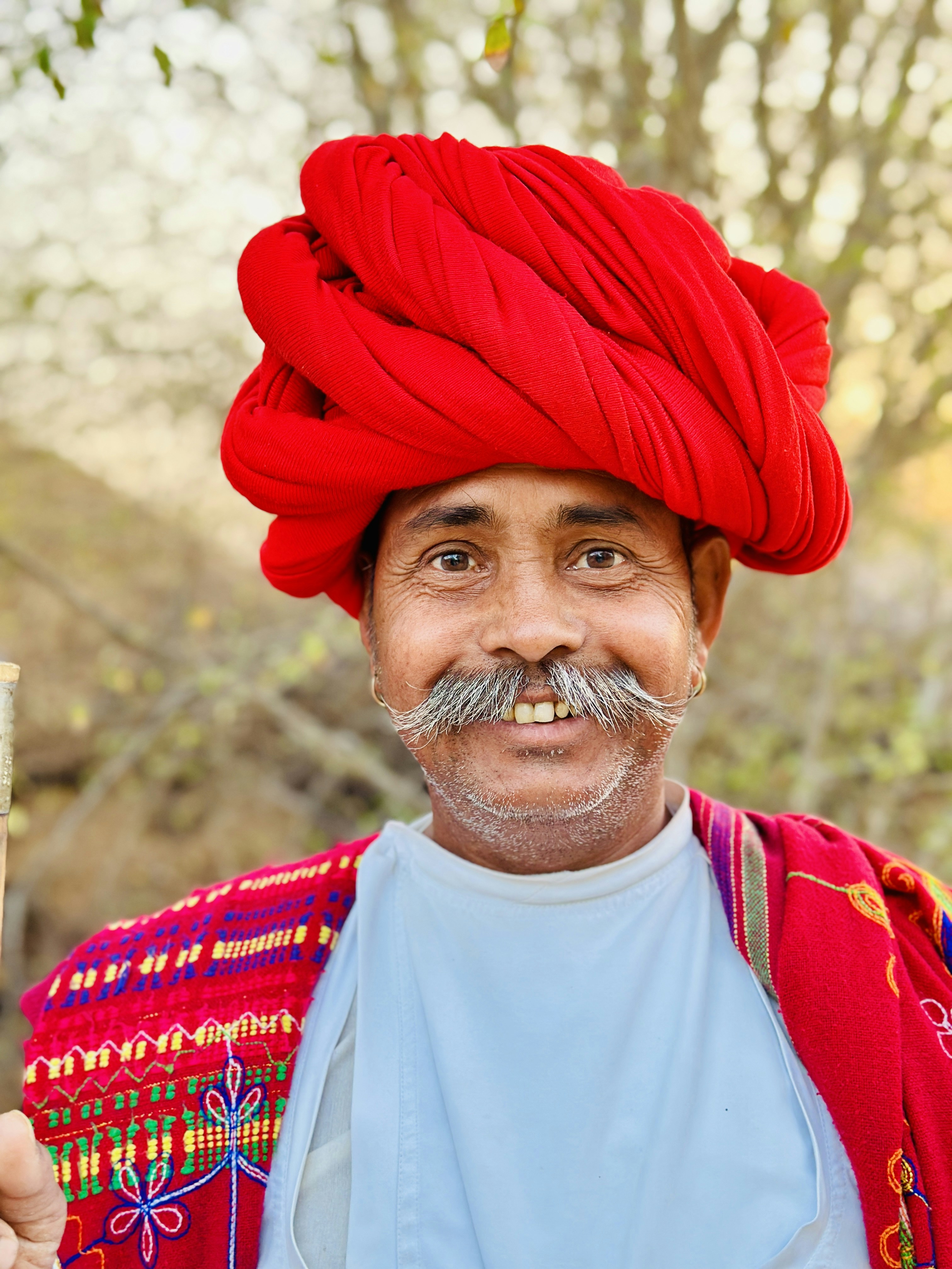 a man with a red turban on his head