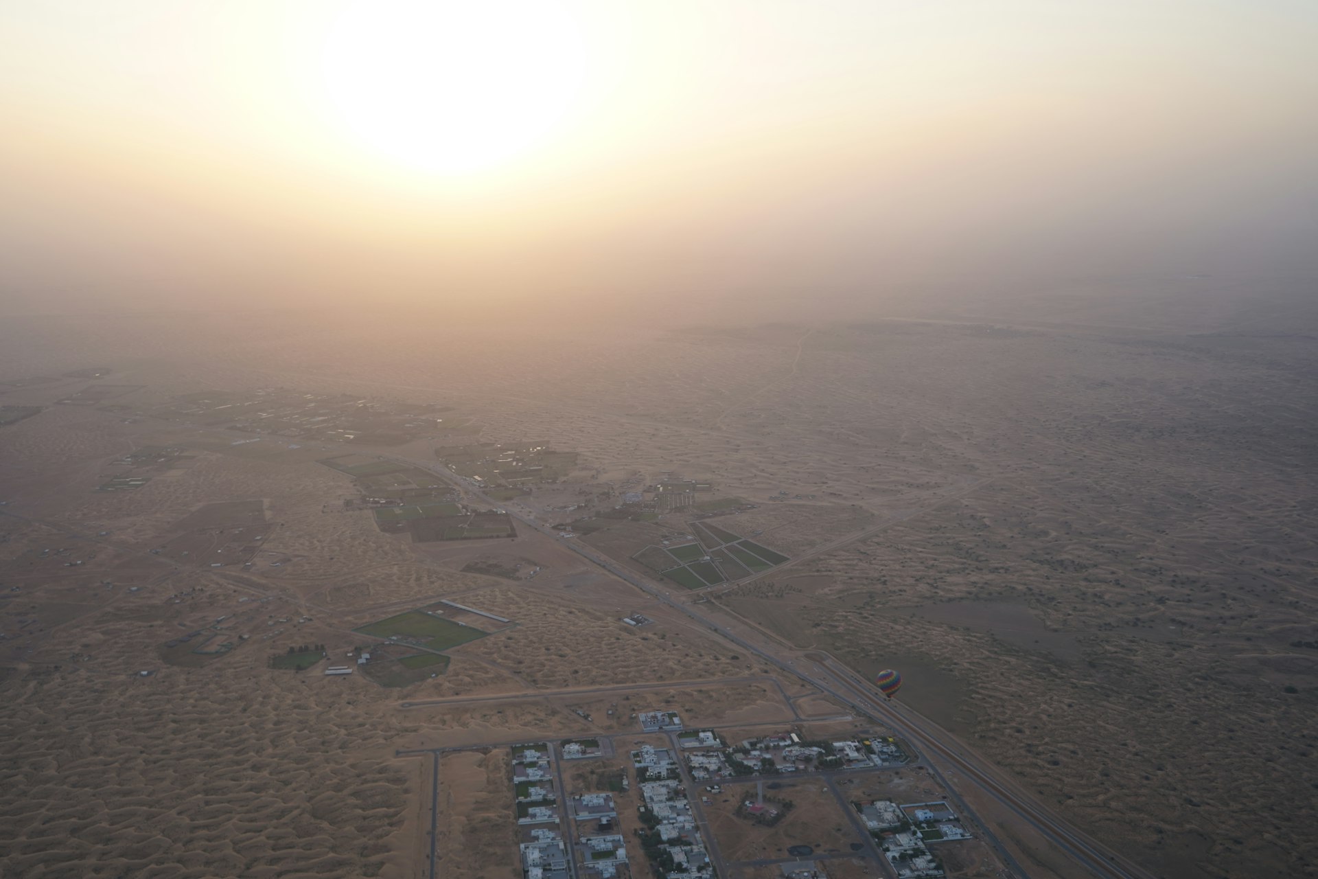an aerial view of a city in the middle of the desert