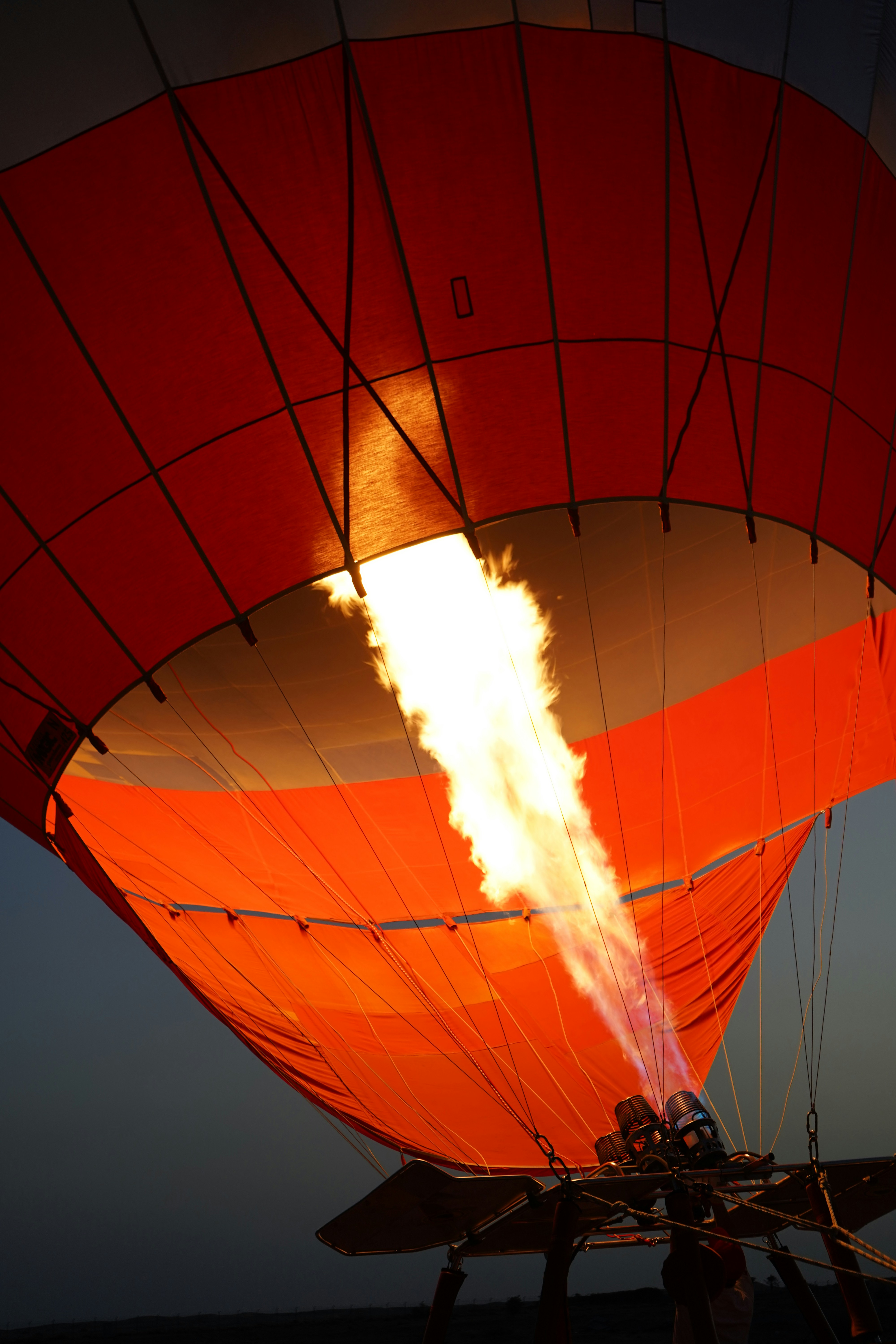 a hot air balloon being inflated in the sky
