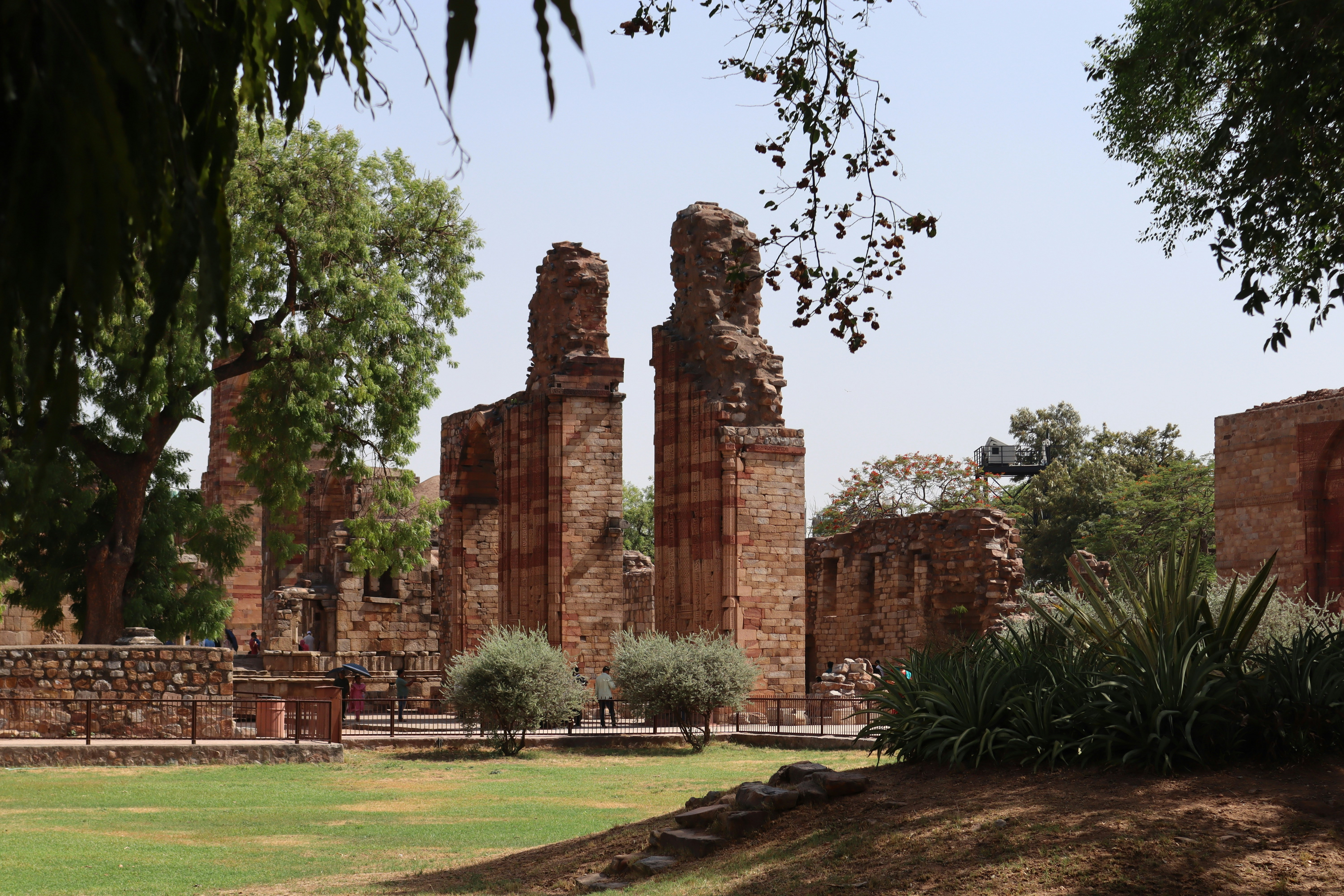 the ruins of a building in a park