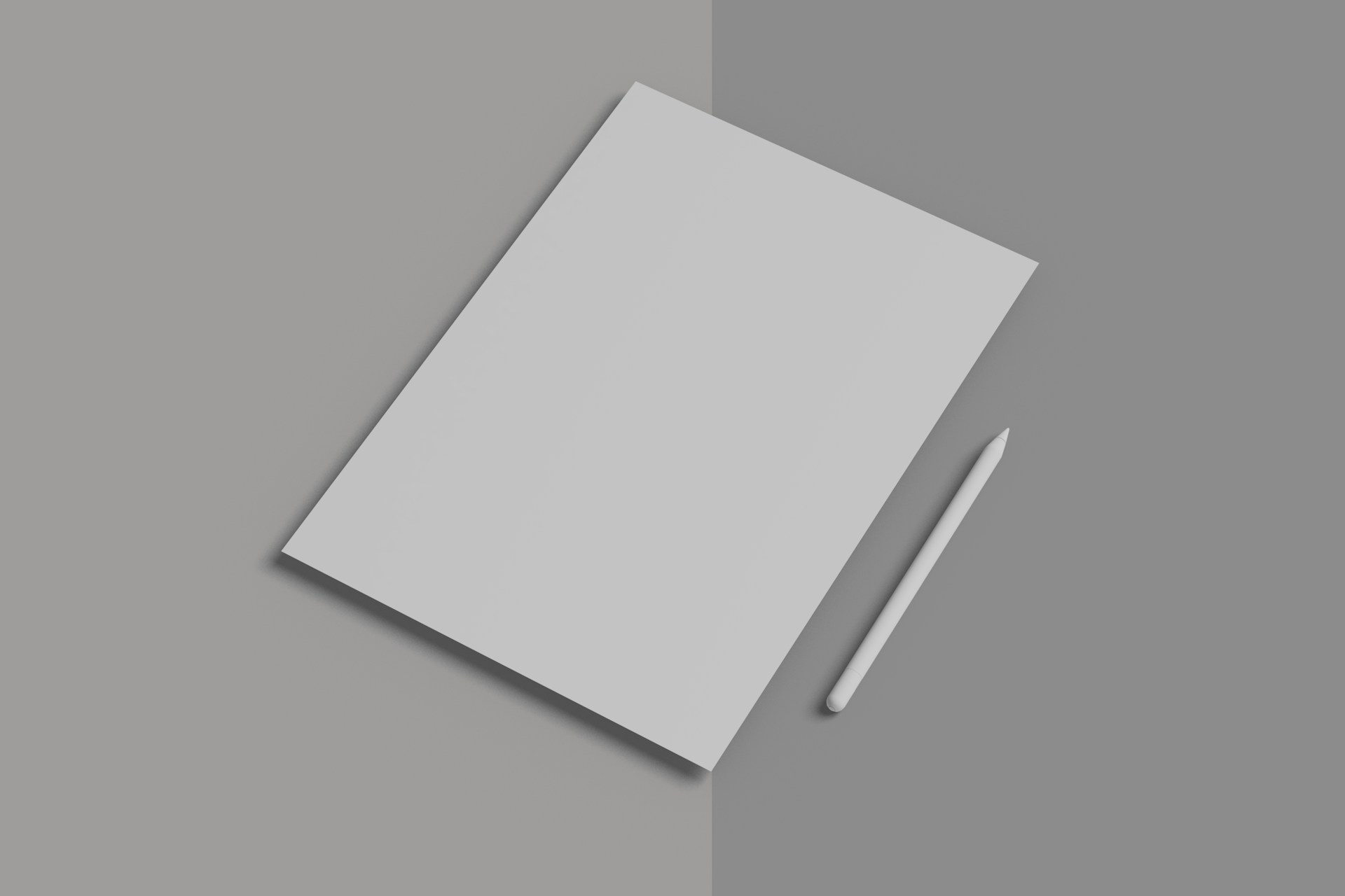 A white notebook with a pen on top of it