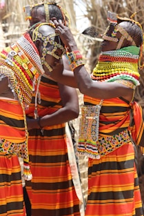 a couple of women standing next to each other