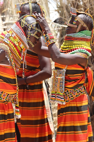 a couple of women standing next to each other