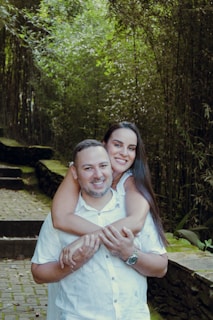 a man holding a woman in his arms