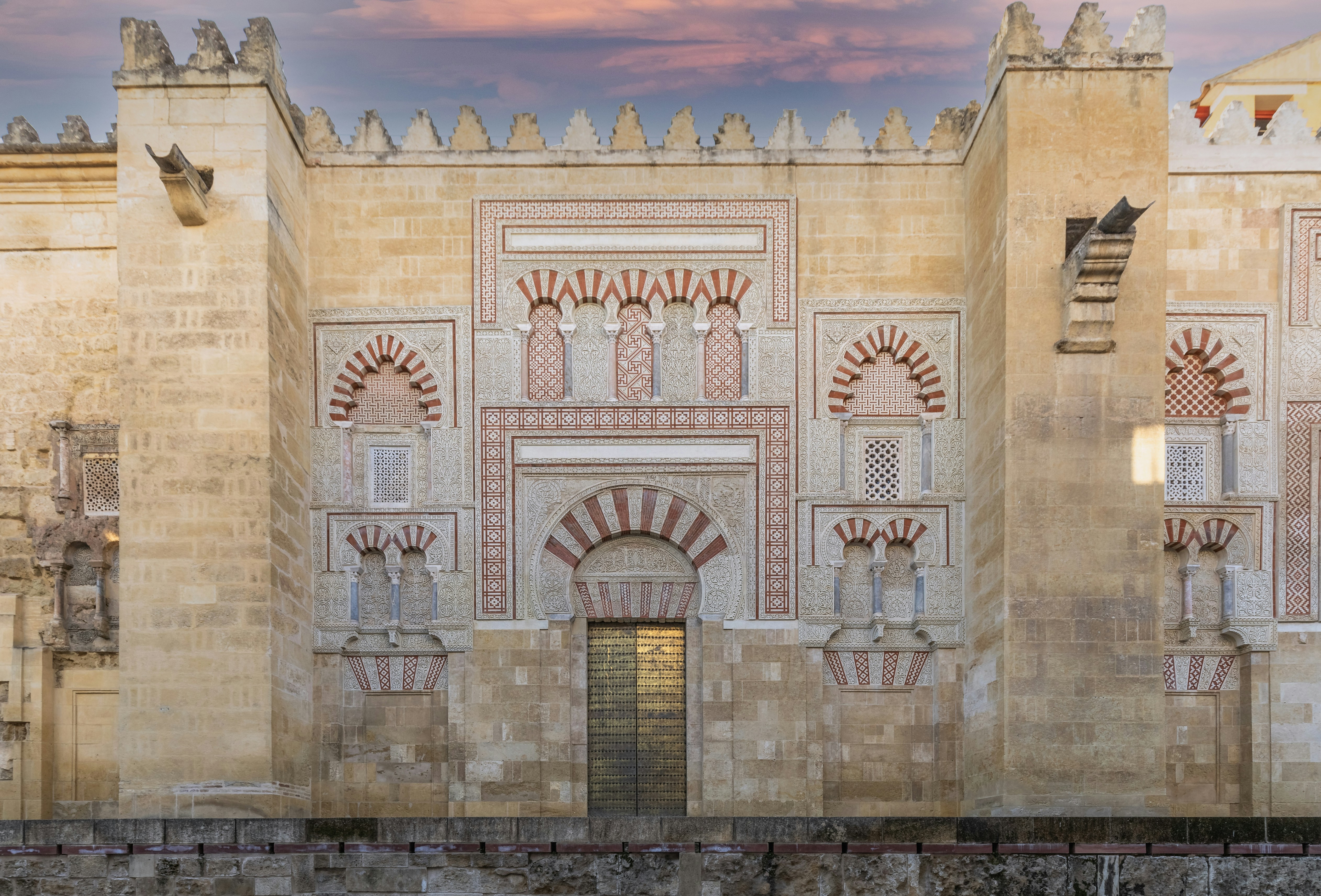 a large building with a clock on the side of it