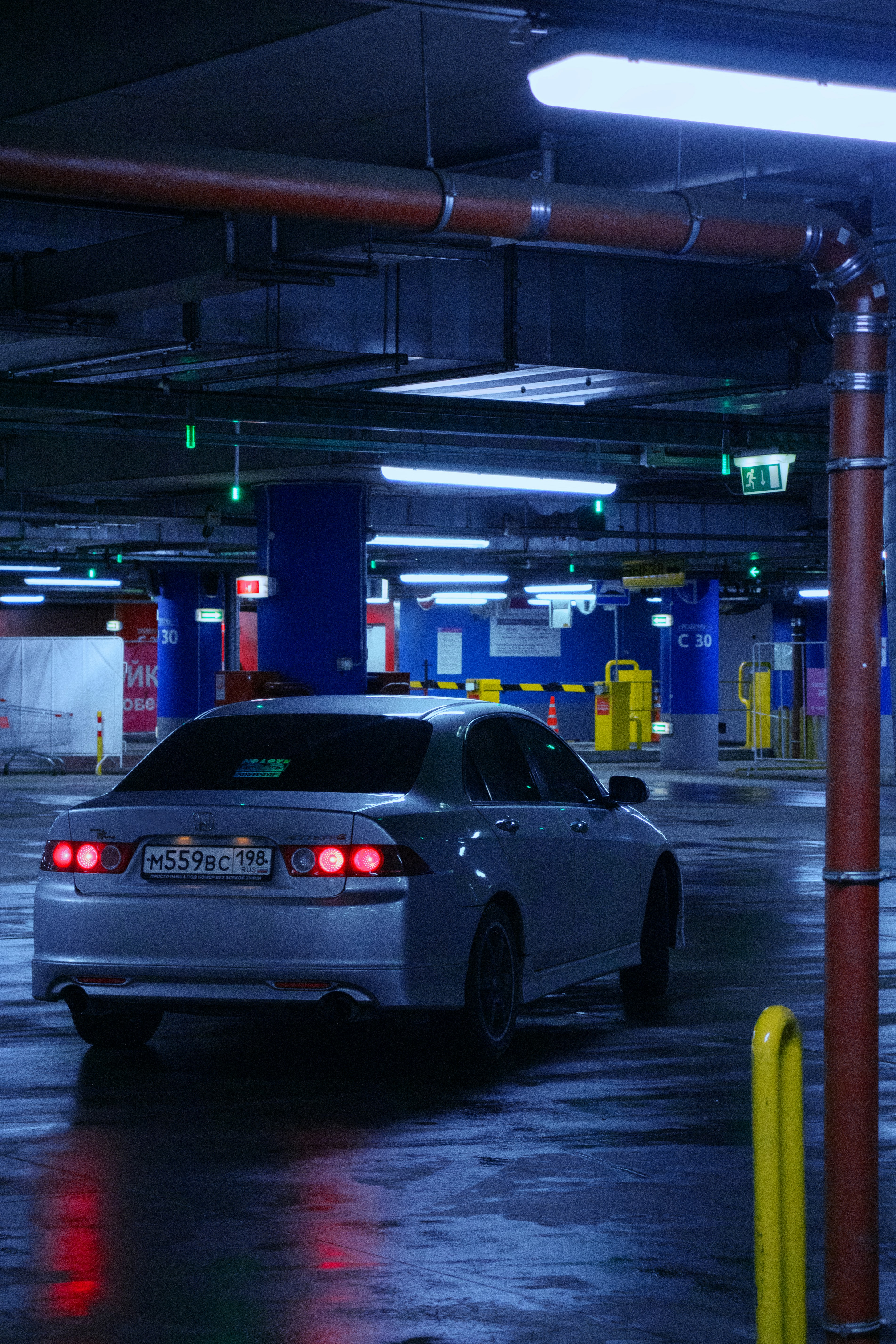 a car is parked in a parking garage