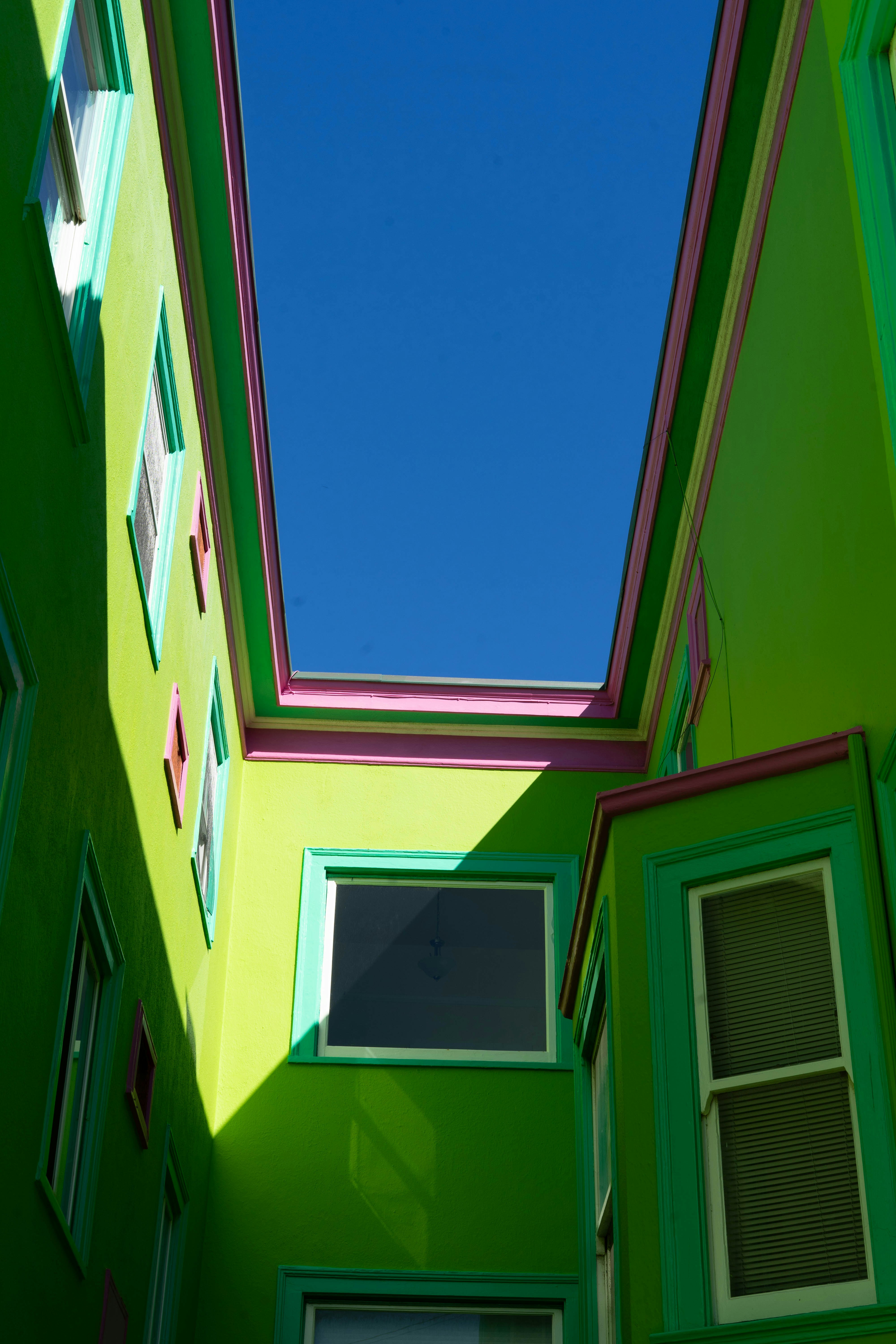 View of A green building with a skylight above it photo – Free Building Image ...