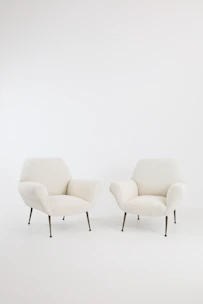 a couple of chairs sitting next to each other