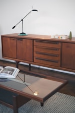 a table with a lamp on top of it