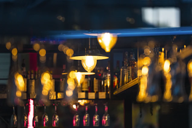 a bunch of bottles that are on a shelf
