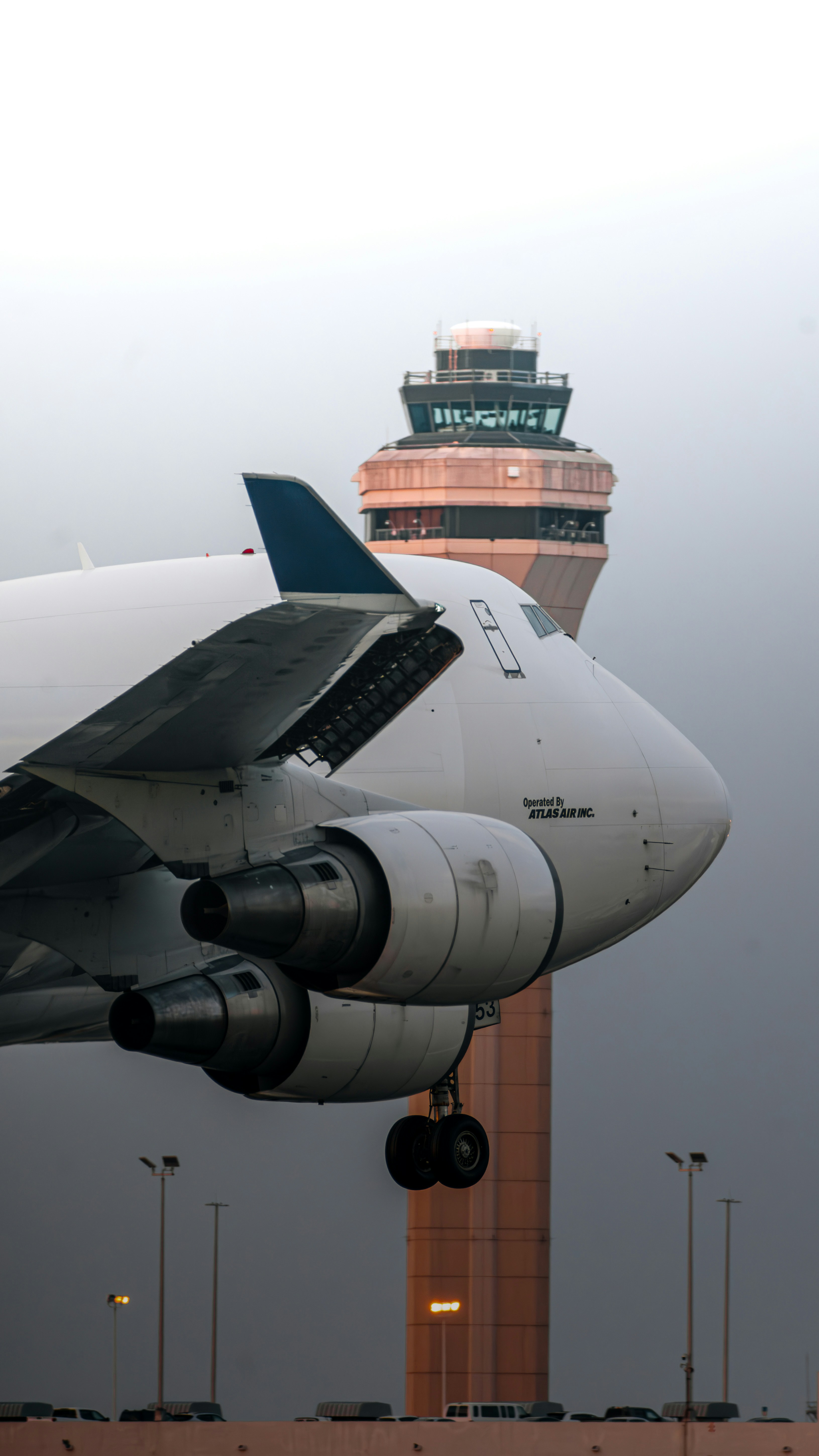 a large jetliner sitting on top of an airport tarmac
