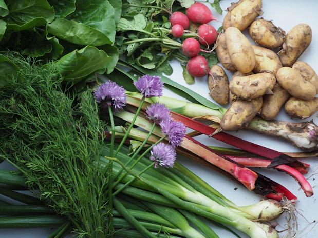 a bunch of vegetables that are on a table