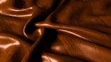 a close up of a brown leather texture