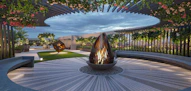 An artistic rendering of a circular patio with a fountain