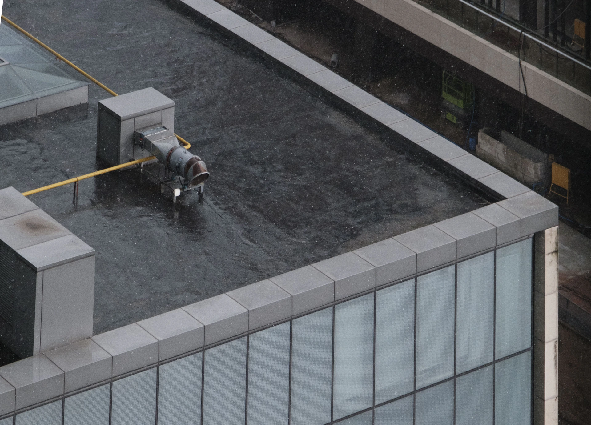 a view of a building from the top of a building