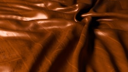a close up of a brown leather material