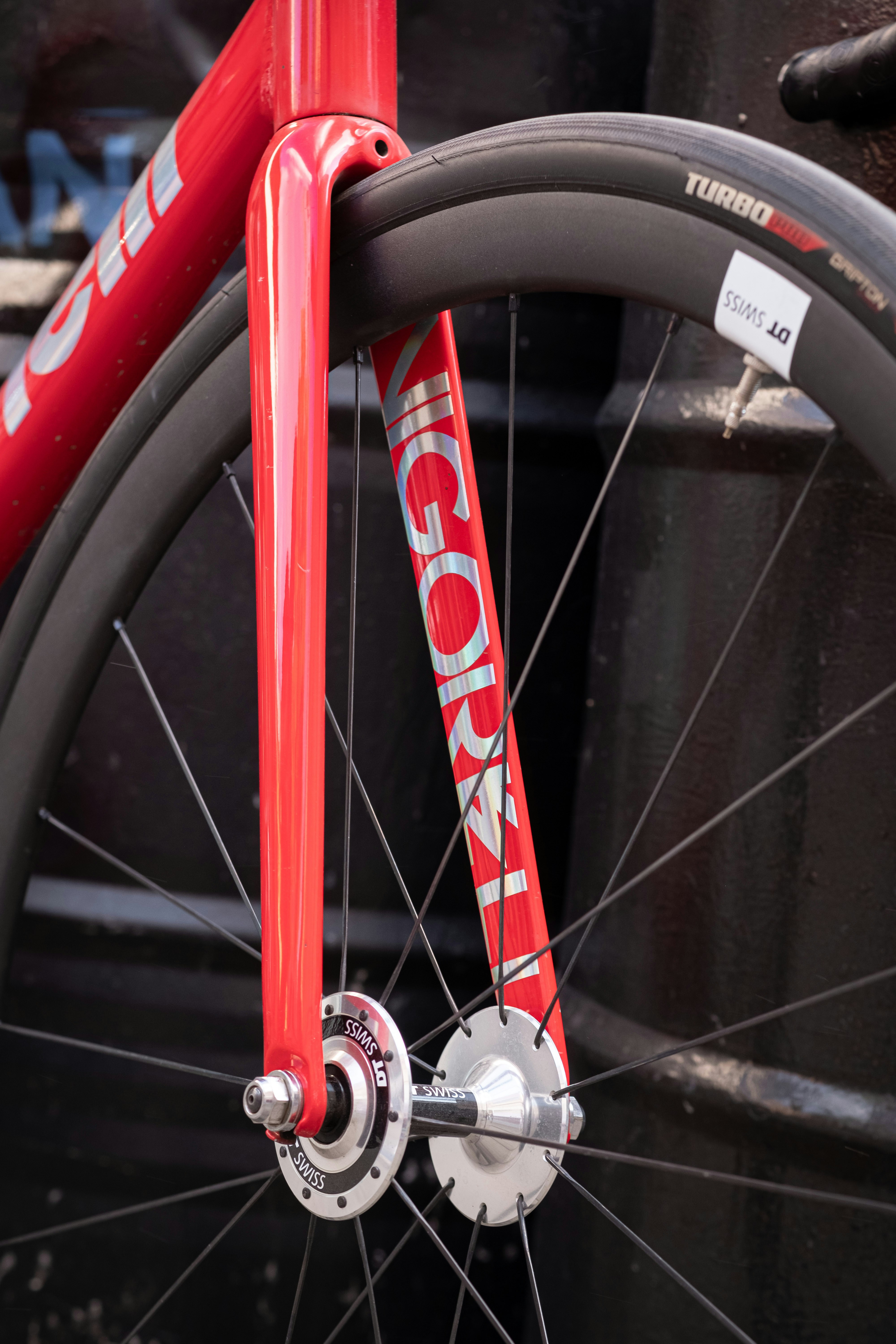 a close up of a bike with a red frame
