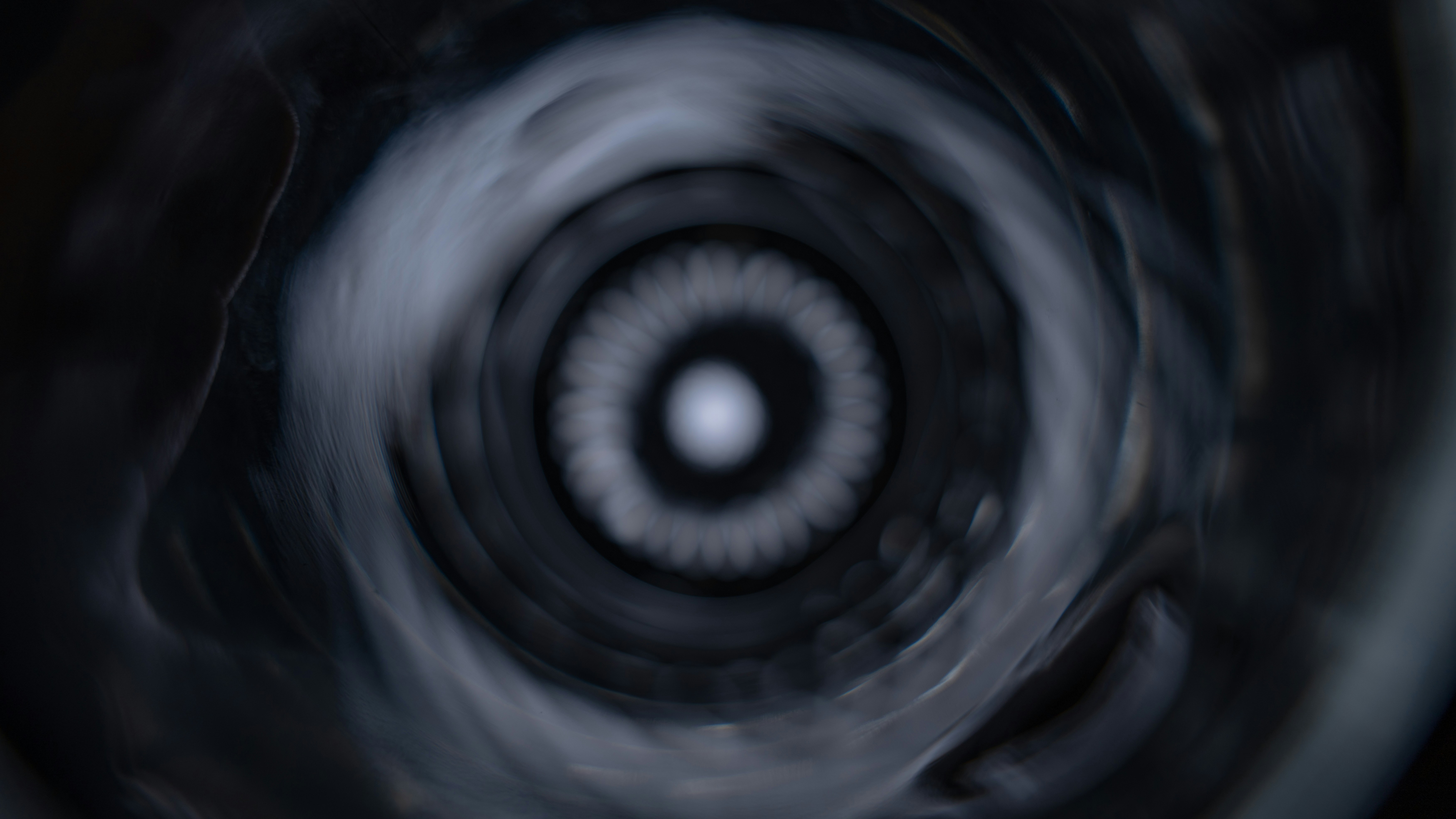 a black and white photo of a circular object