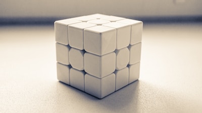 a white cube sitting on top of a table