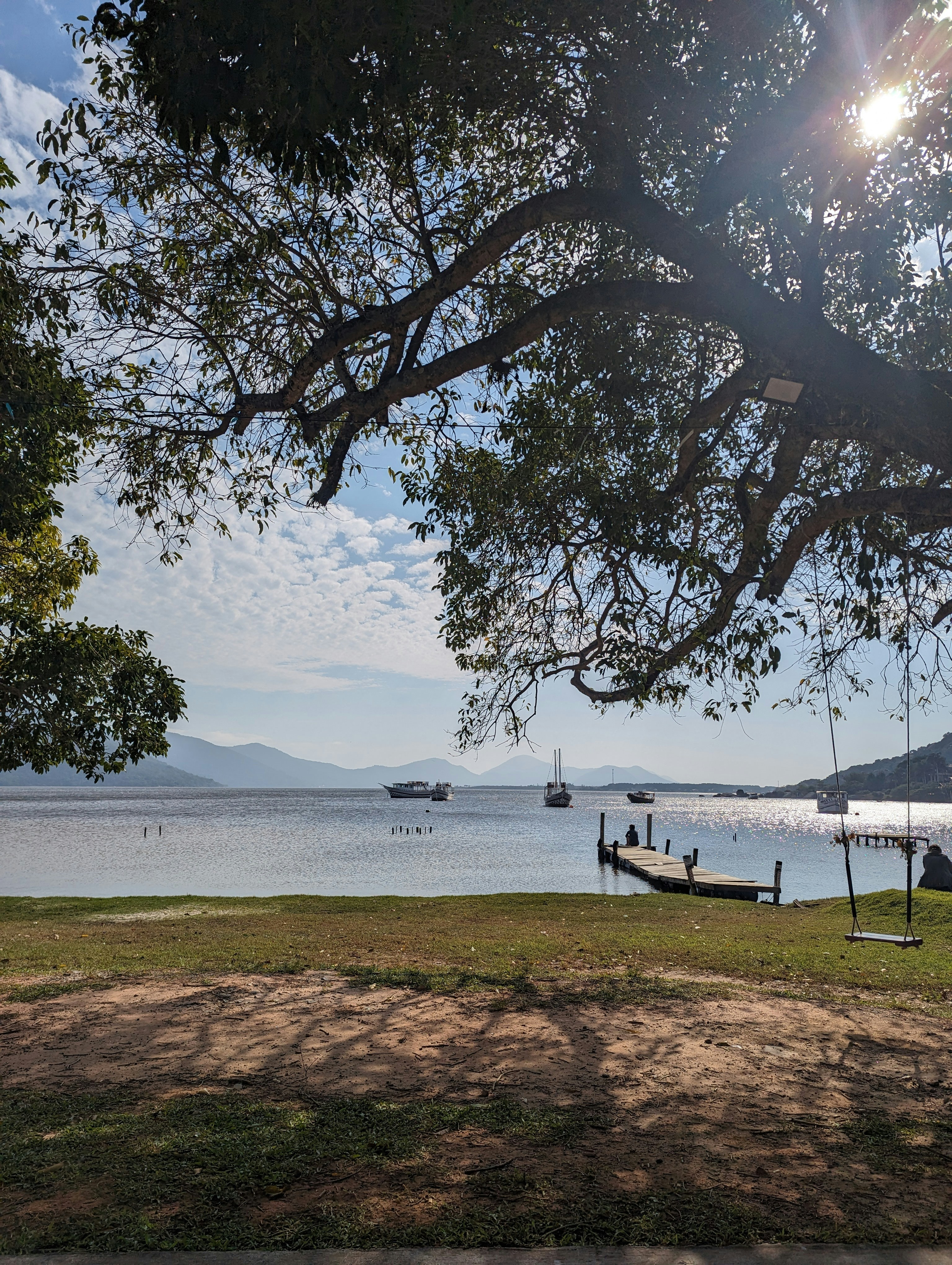 a view of a body of water with boats in it