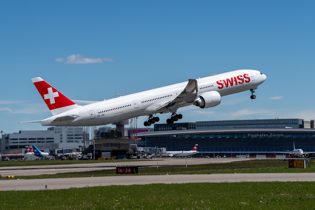 a large passenger jet taking off from an airport runway