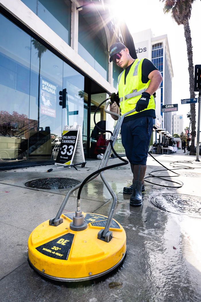 Pressure washing concrete surface