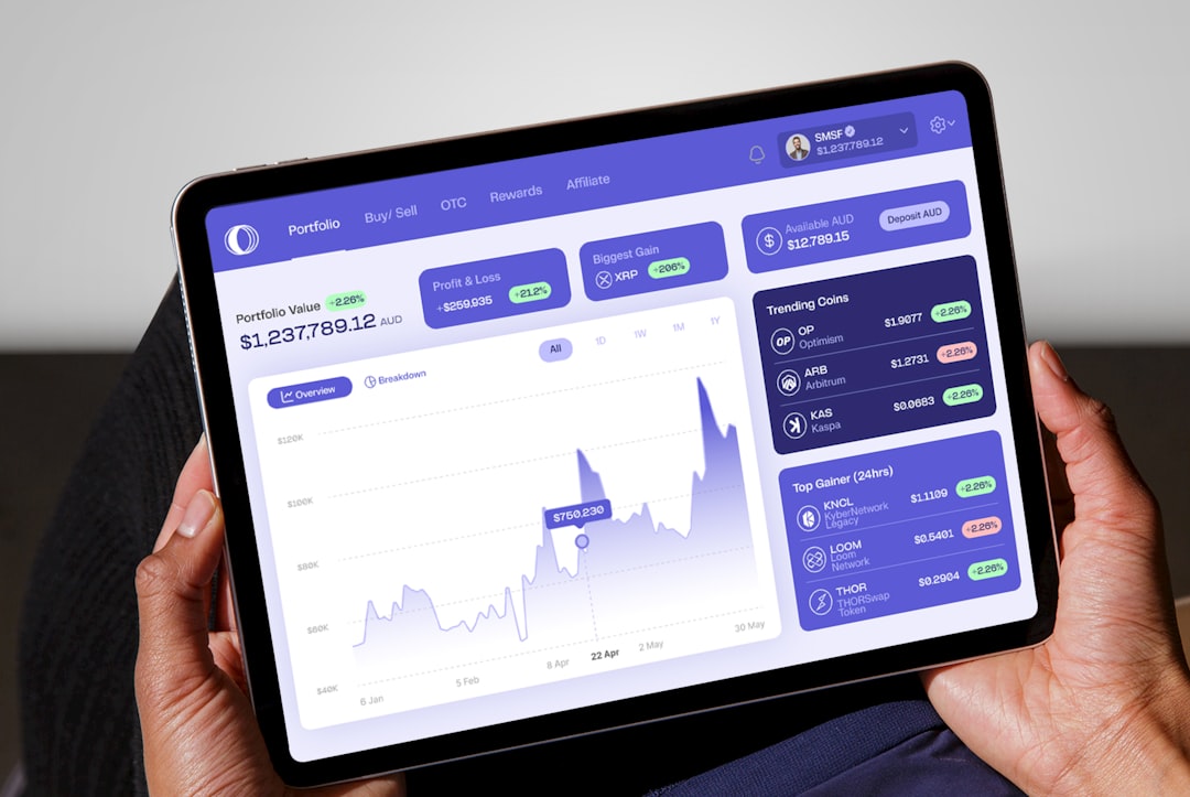 a person holding a tablet displaying a stock chart, Please make sure to credit coinstash.com.au