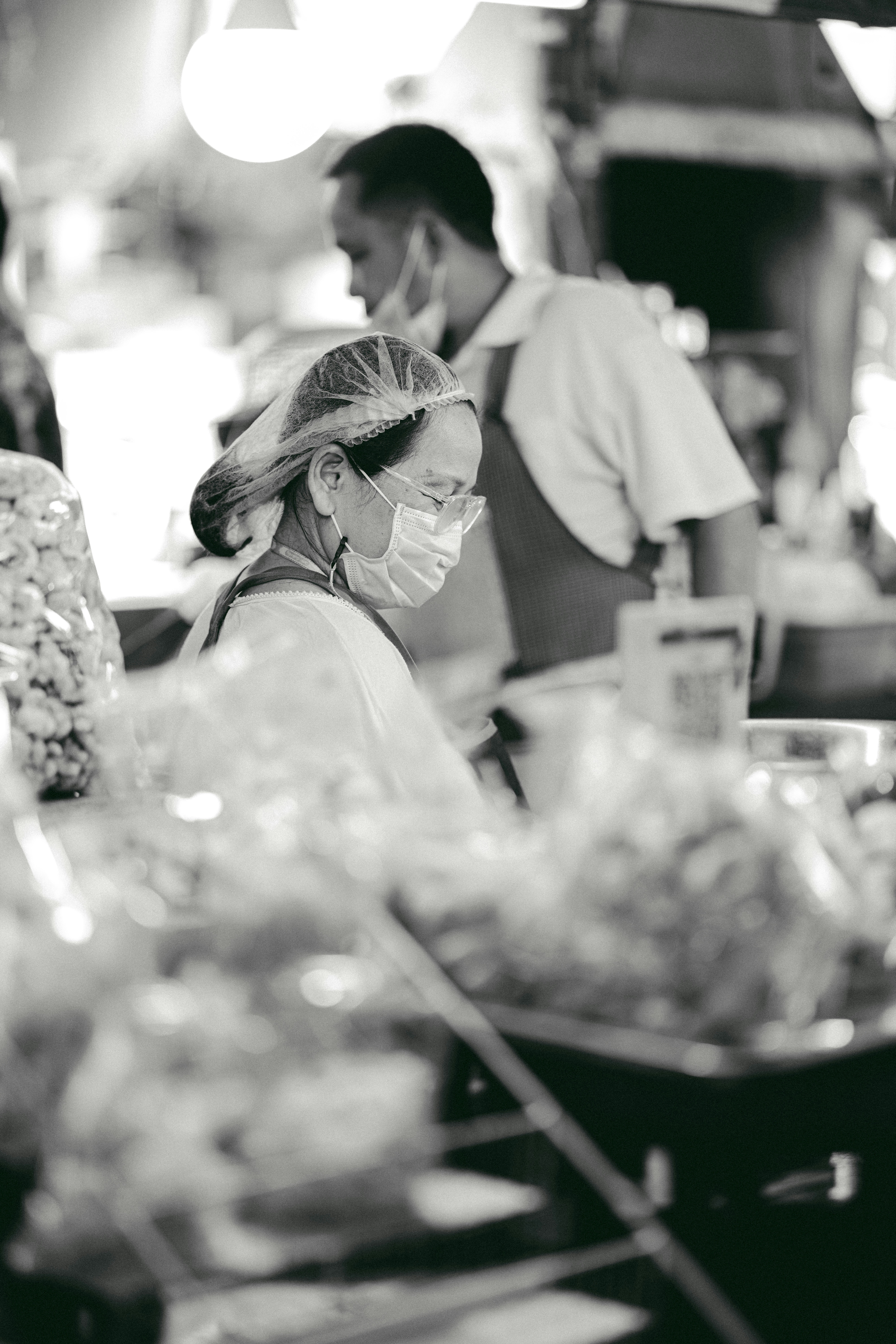 a woman wearing a face mask in a store