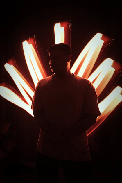 Silhouette with radiating light tubes
