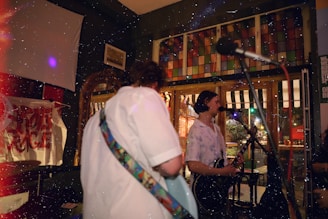 a couple of people that are standing in a room