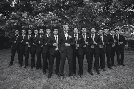 a group of men standing next to each other